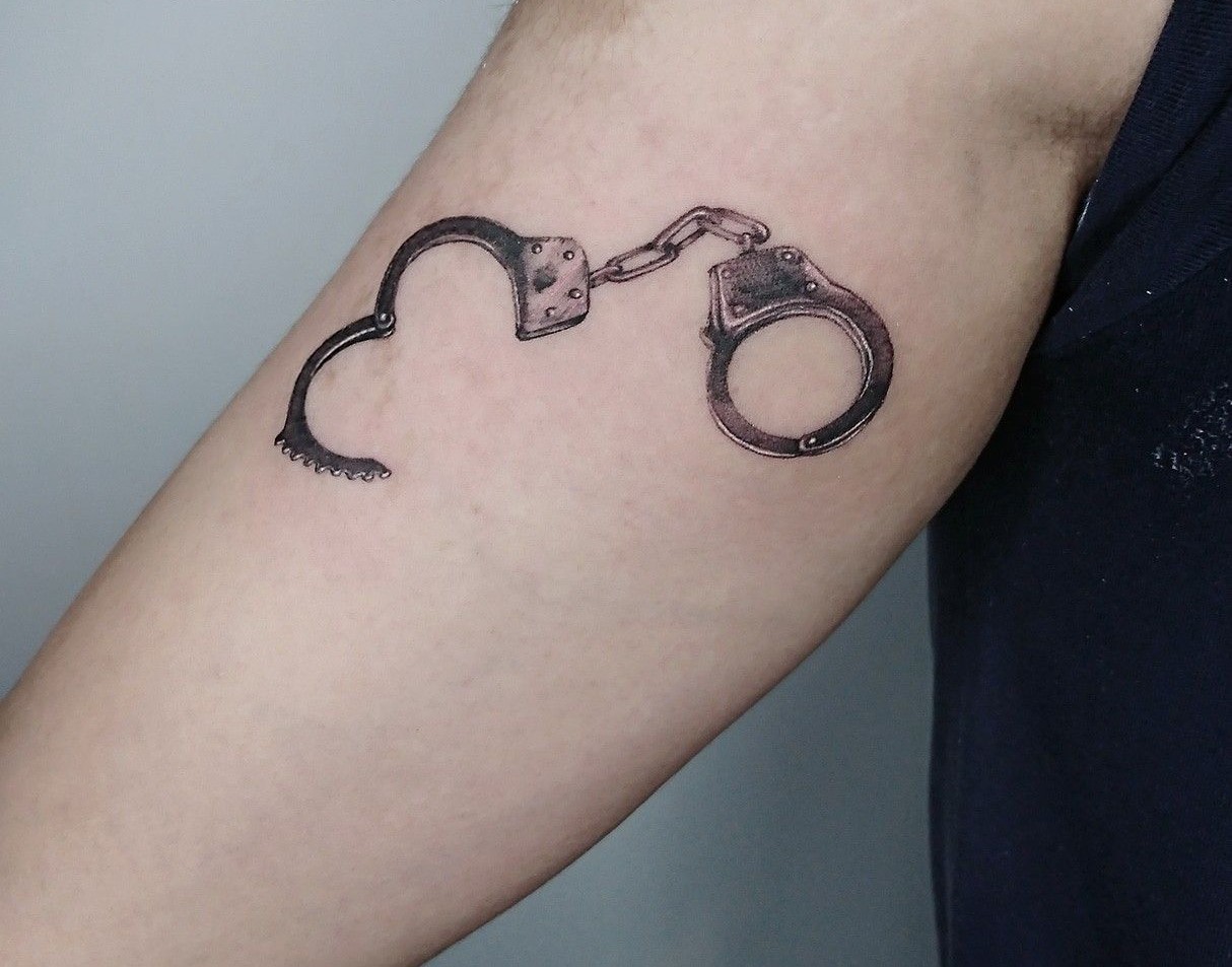 Meaning of Handcuff Tattoos | BlendUp